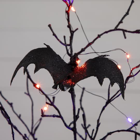 2ft. Pre-Lit Artificial Black Spooky Twig Tree with Bats and 40 Orange & Purple LED Lights